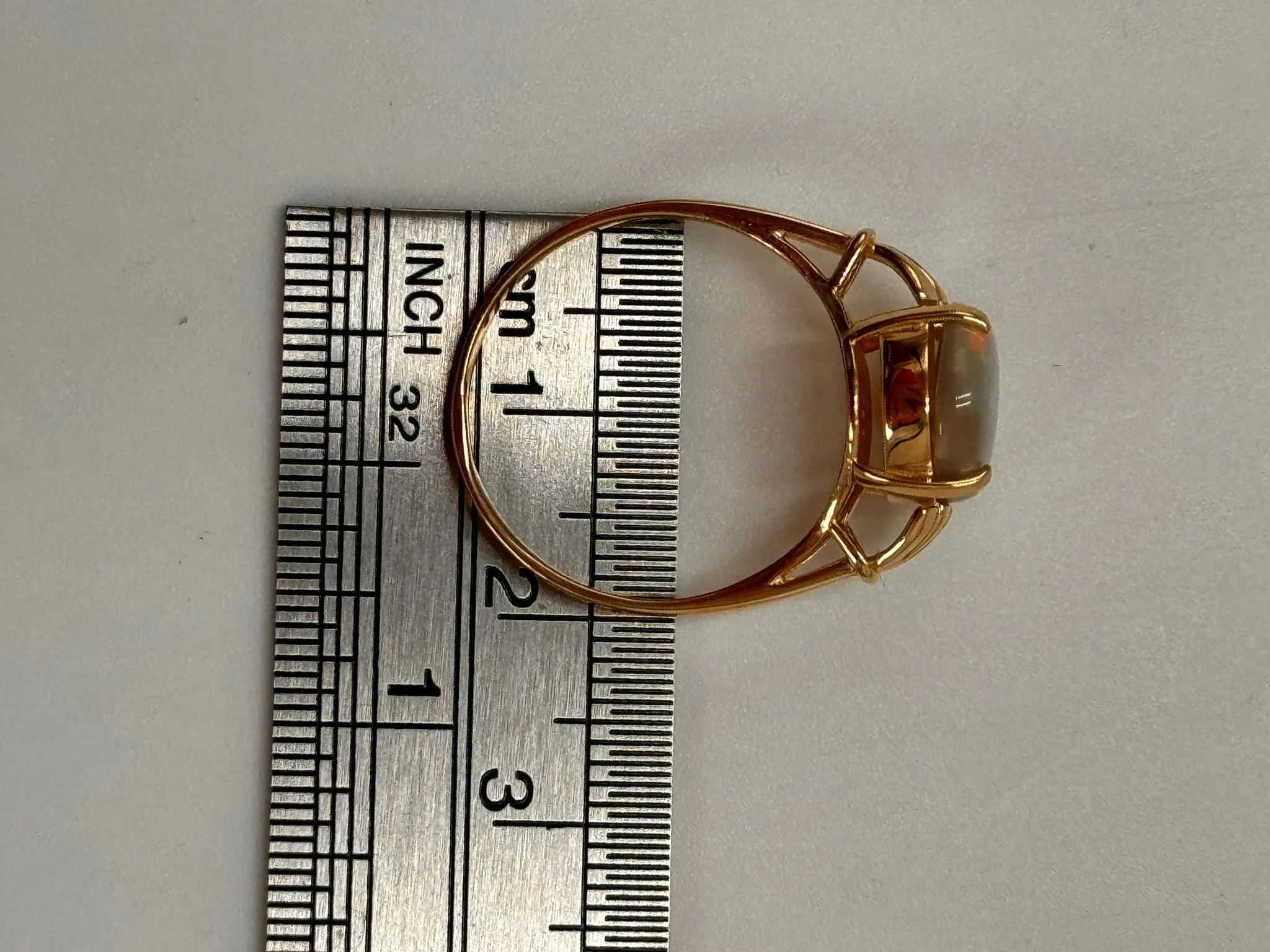 Elegant 14K Yellow Gold Opal Ring - Radiant and Refined