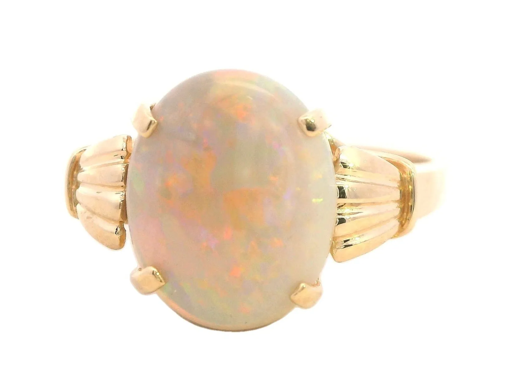 Elegant 14K Yellow Gold Opal Ring - Radiant and Refined