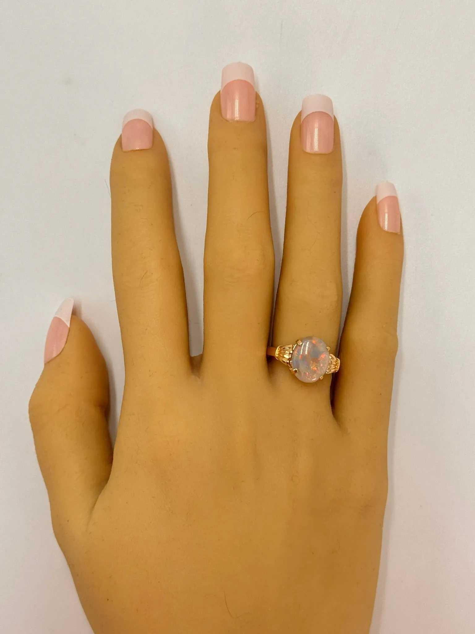 Elegant 14K Yellow Gold Opal Ring - Radiant and Refined