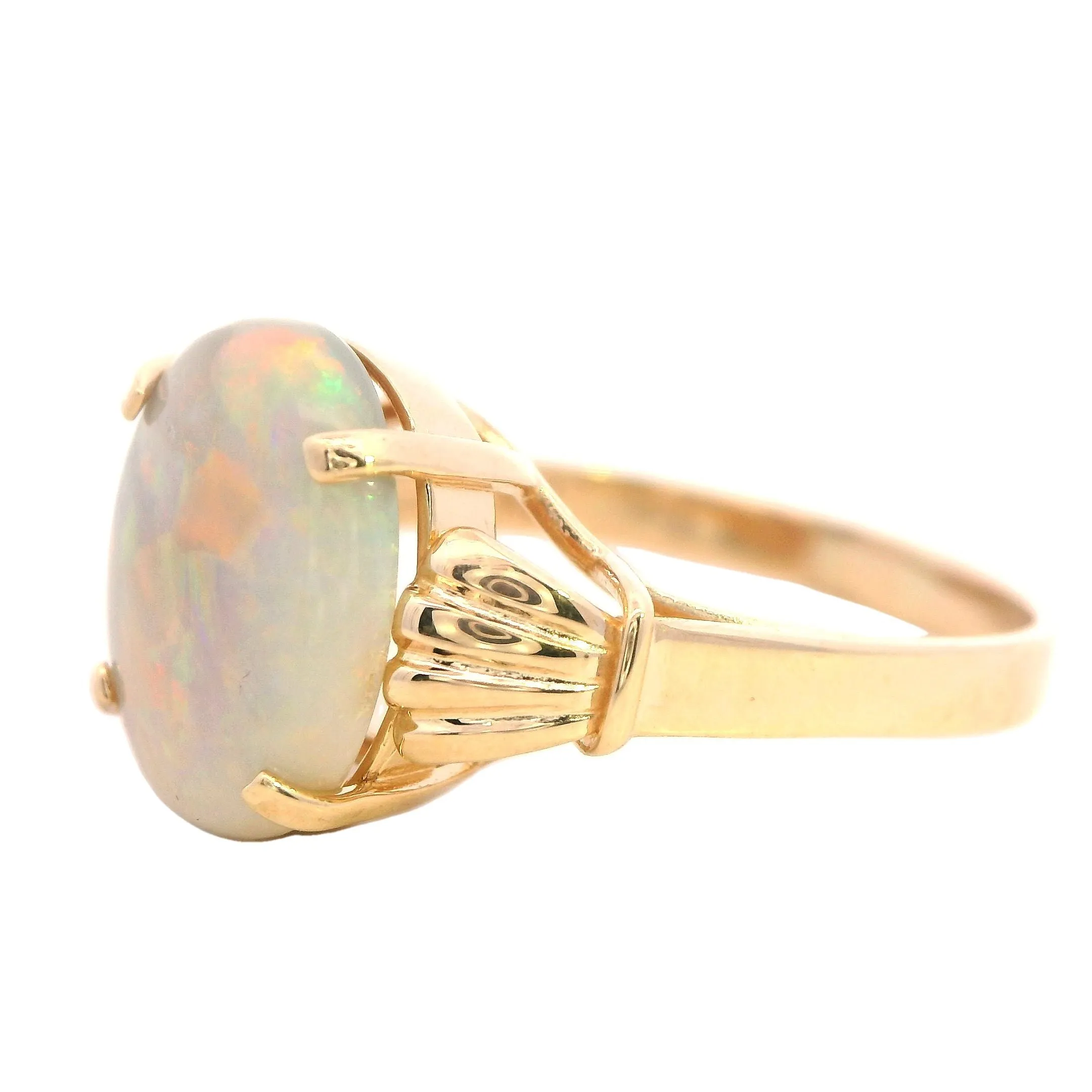 Elegant 14K Yellow Gold Opal Ring - Radiant and Refined