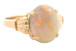 Elegant 14K Yellow Gold Opal Ring - Radiant and Refined