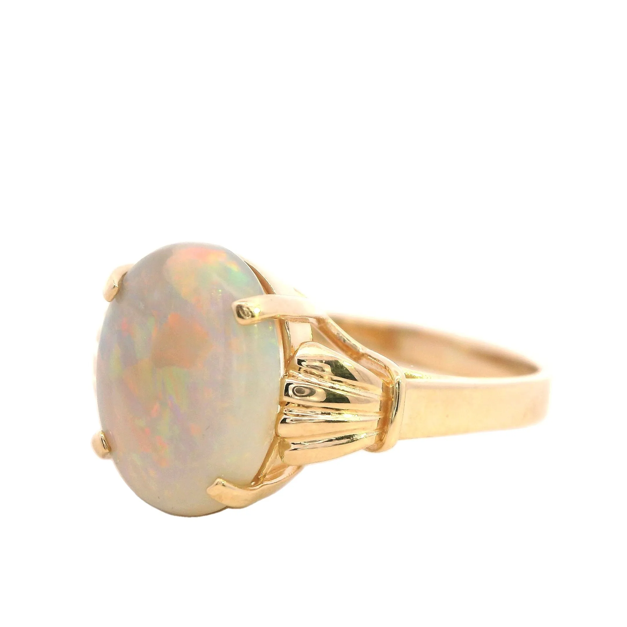 Elegant 14K Yellow Gold Opal Ring - Radiant and Refined