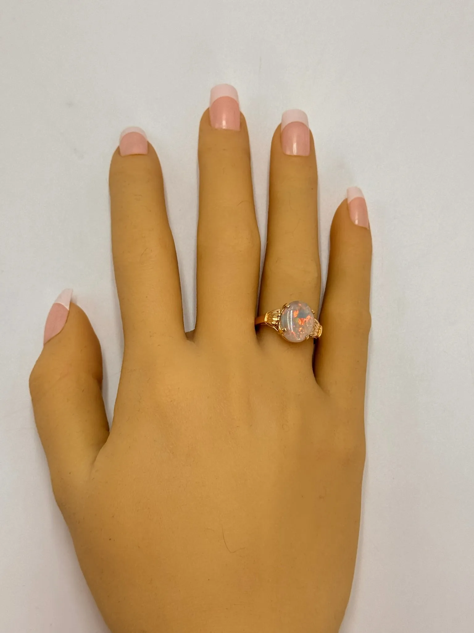Elegant 14K Yellow Gold Opal Ring - Radiant and Refined