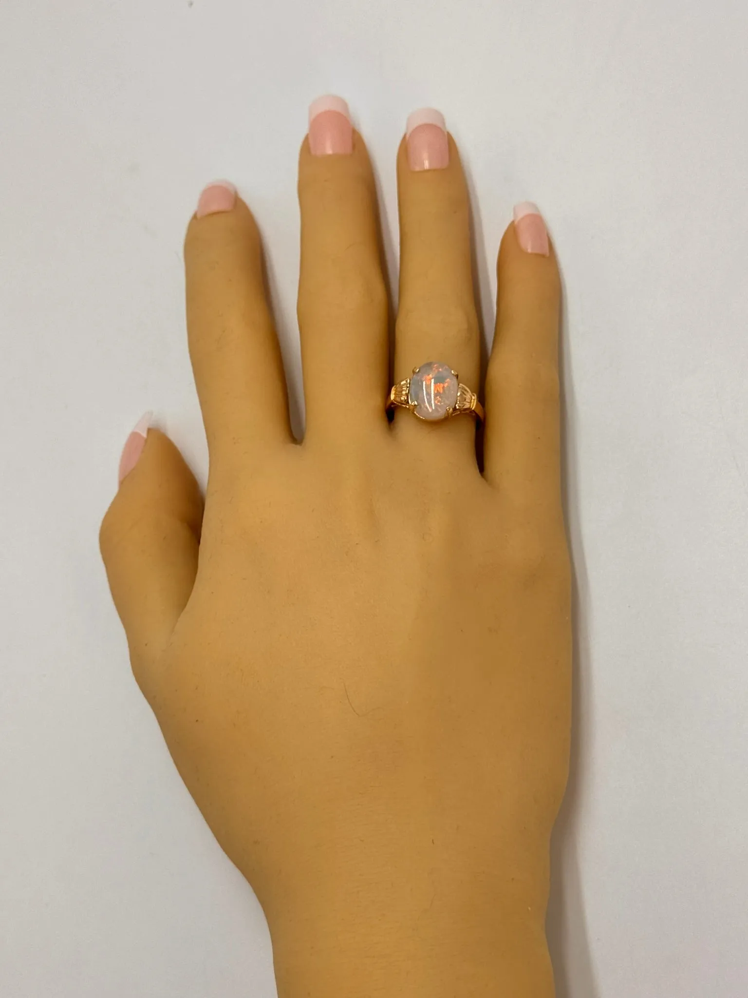 Elegant 14K Yellow Gold Opal Ring - Radiant and Refined