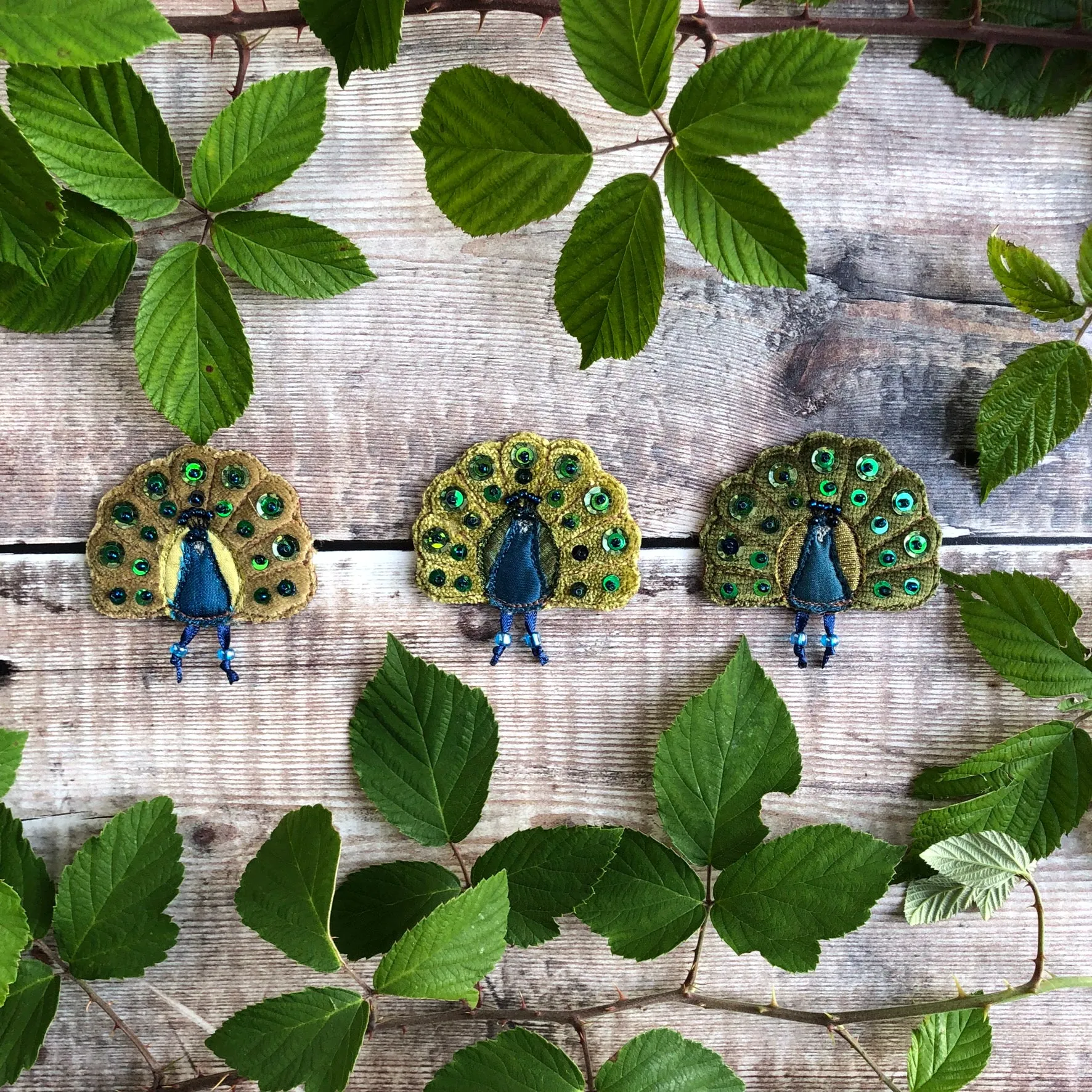 Fabric peacock brooch