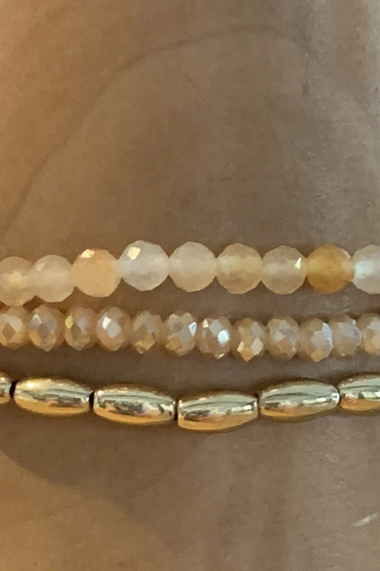 Semi Precious Three Strand Stretch Crystal And Gold Bracelet  Set