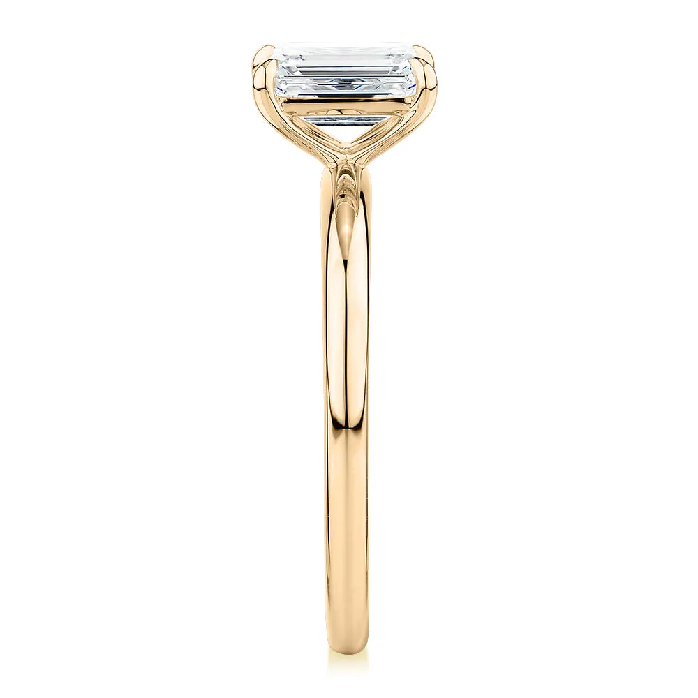 Signature Simulant Diamond 1.00 carat* emerald cut solitaire engagement ring in 14 carat yellow gold