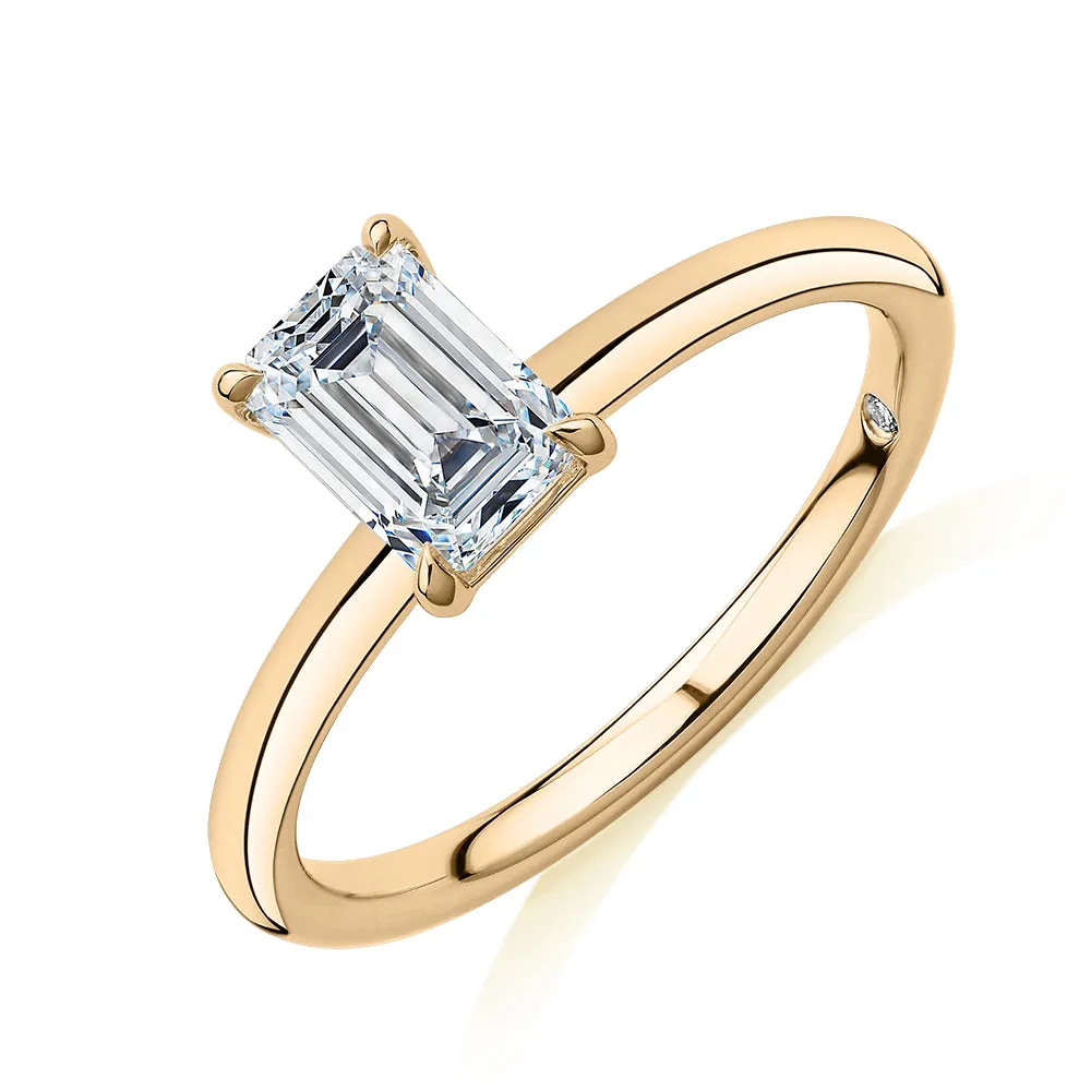 Signature Simulant Diamond 1.00 carat* emerald cut solitaire engagement ring in 14 carat yellow gold