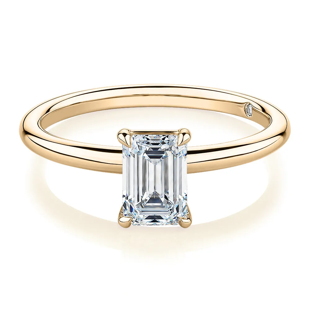 Signature Simulant Diamond 1.00 carat* emerald cut solitaire engagement ring in 14 carat yellow gold