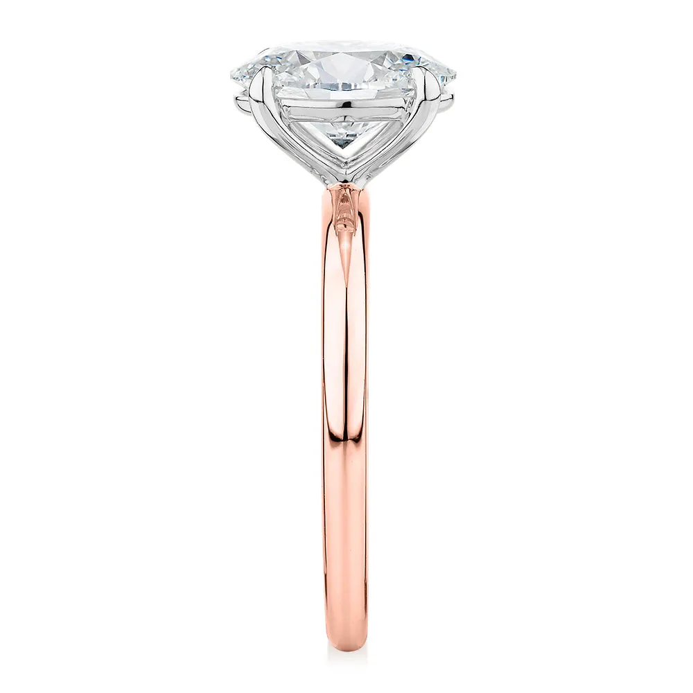 Signature Simulant Diamond 2.00 carat* oval solitaire engagement ring in 14 carat rose and white gold