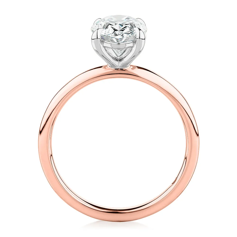 Signature Simulant Diamond 2.00 carat* oval solitaire engagement ring in 14 carat rose and white gold